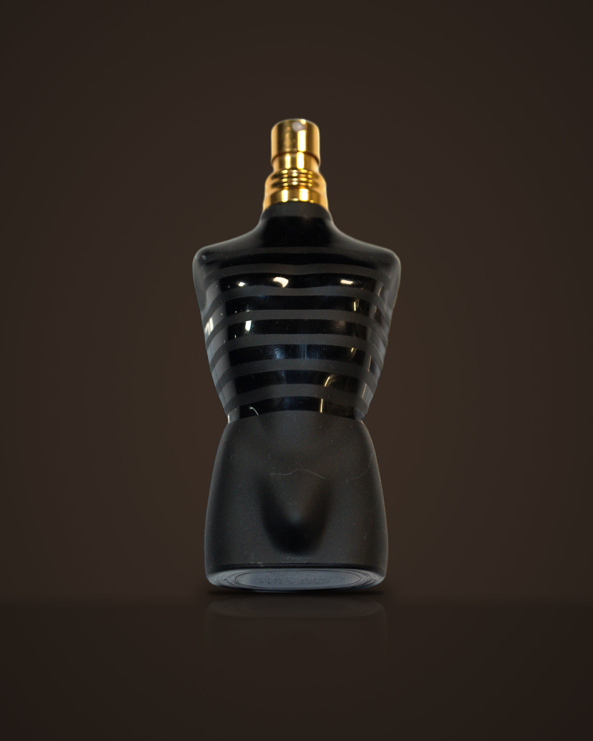 Le Male Elixir — Jean Paul Gaultier fragrance decant on dark background